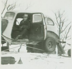 1930-something Ford with V-8 engine, damaged in an accident, powered the rope tow. Note the extra wheel/tire mounted on the rear to allow the rope to ride in between. When a skier grabbed the rope, the man behind the wheel "gave it some gas" to get them up the hill.